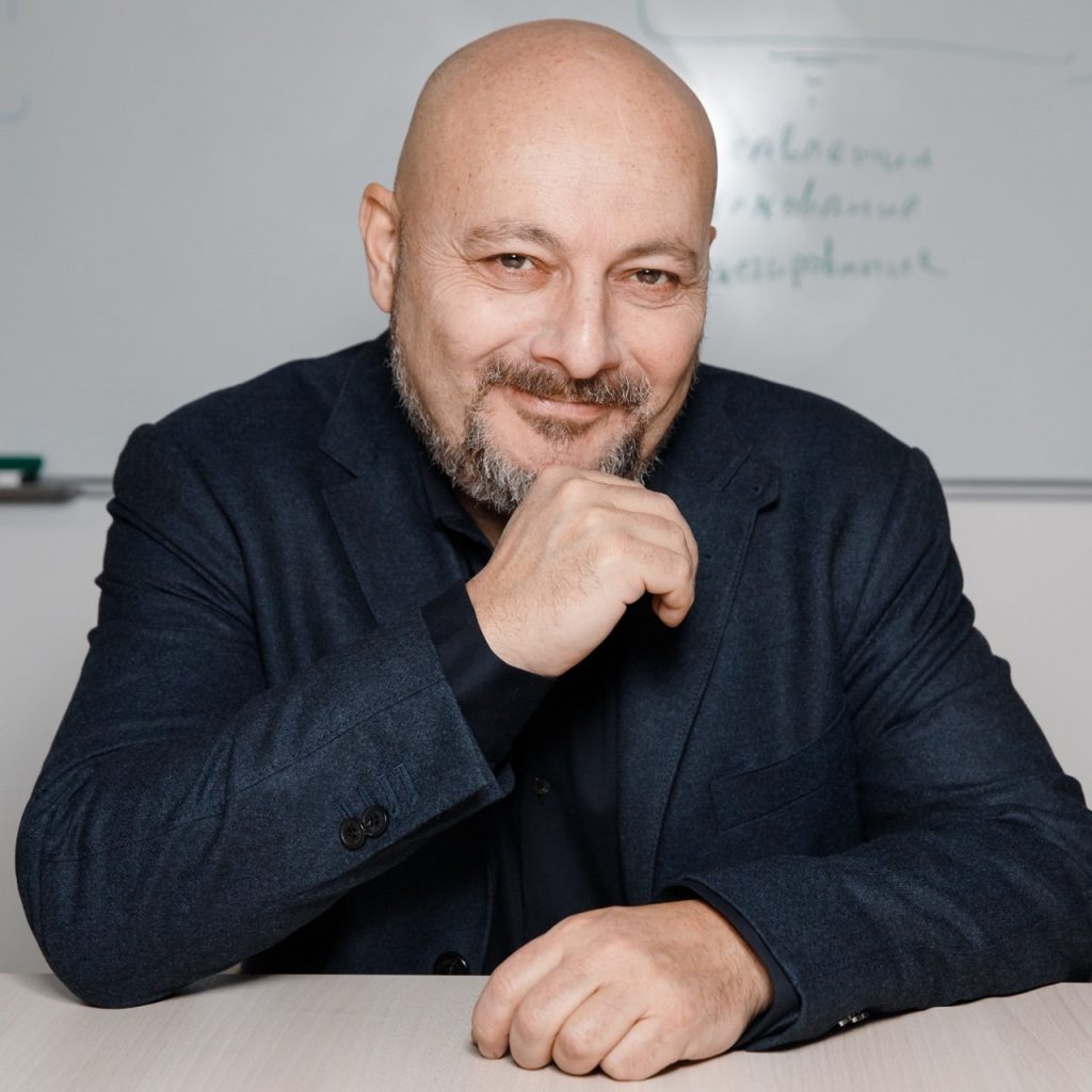 Евгений Коган экономист